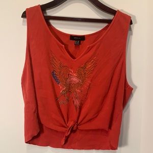 Biker tank top tee. Style with some daisy dukes and dr. Martins for a cute look!